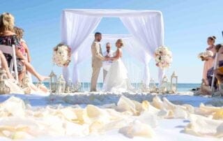 A couple plans their dream beach wedding with the help of experienced key west wedding planners.